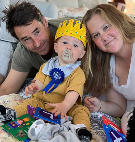Amy with her husband and son, Gene