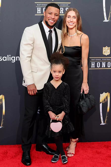 Saquon Barkley with his fiancee Anna Congdon and their daughter